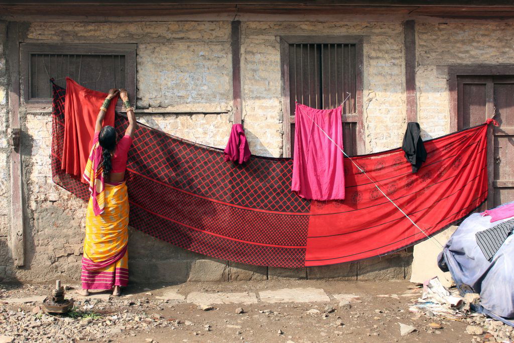 Pune,,Maharashtra,,India,,25,June,2019,Woman,Drying,Clothes,In